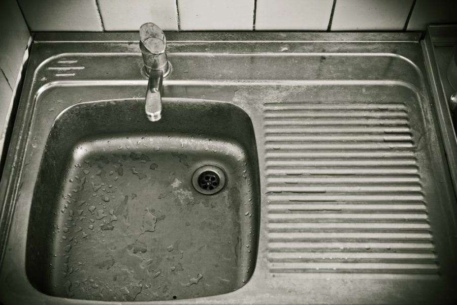 Kitchen sink in need of kitchen demolition