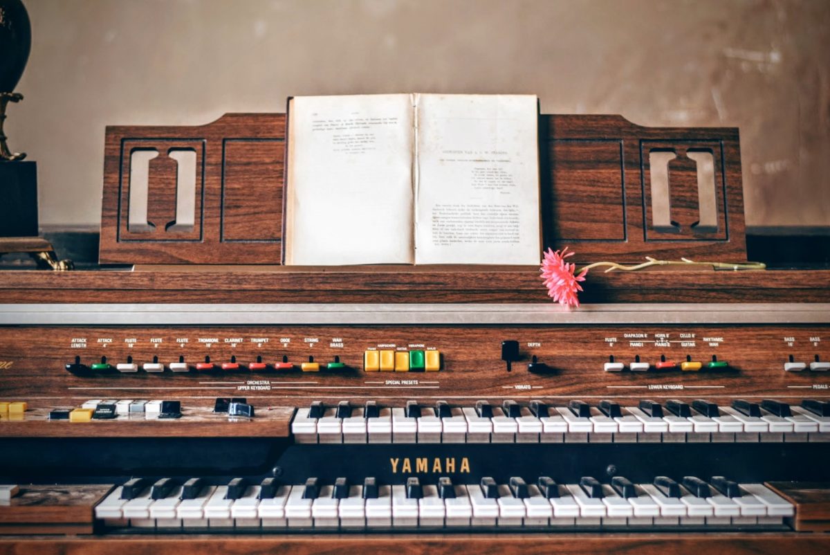 Old organ in need of piano removal services in North Carolina